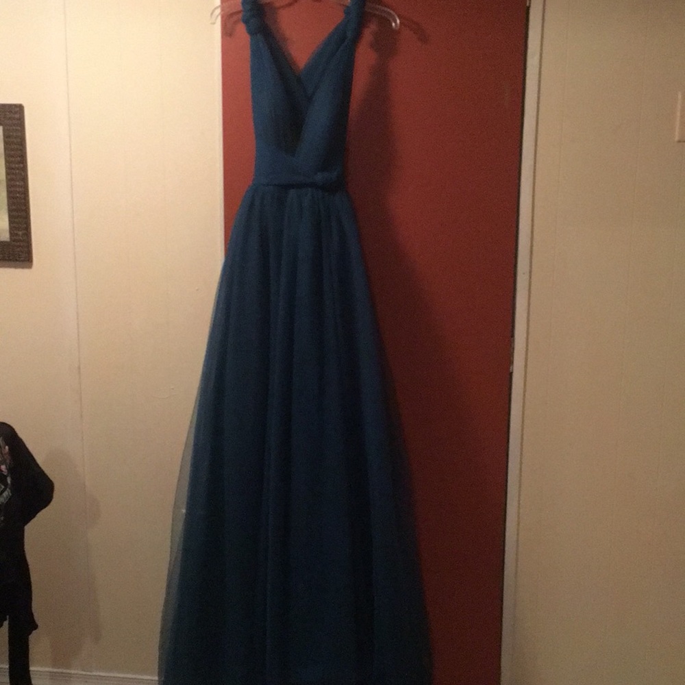 Emerald green evening gown. Tule over satin.